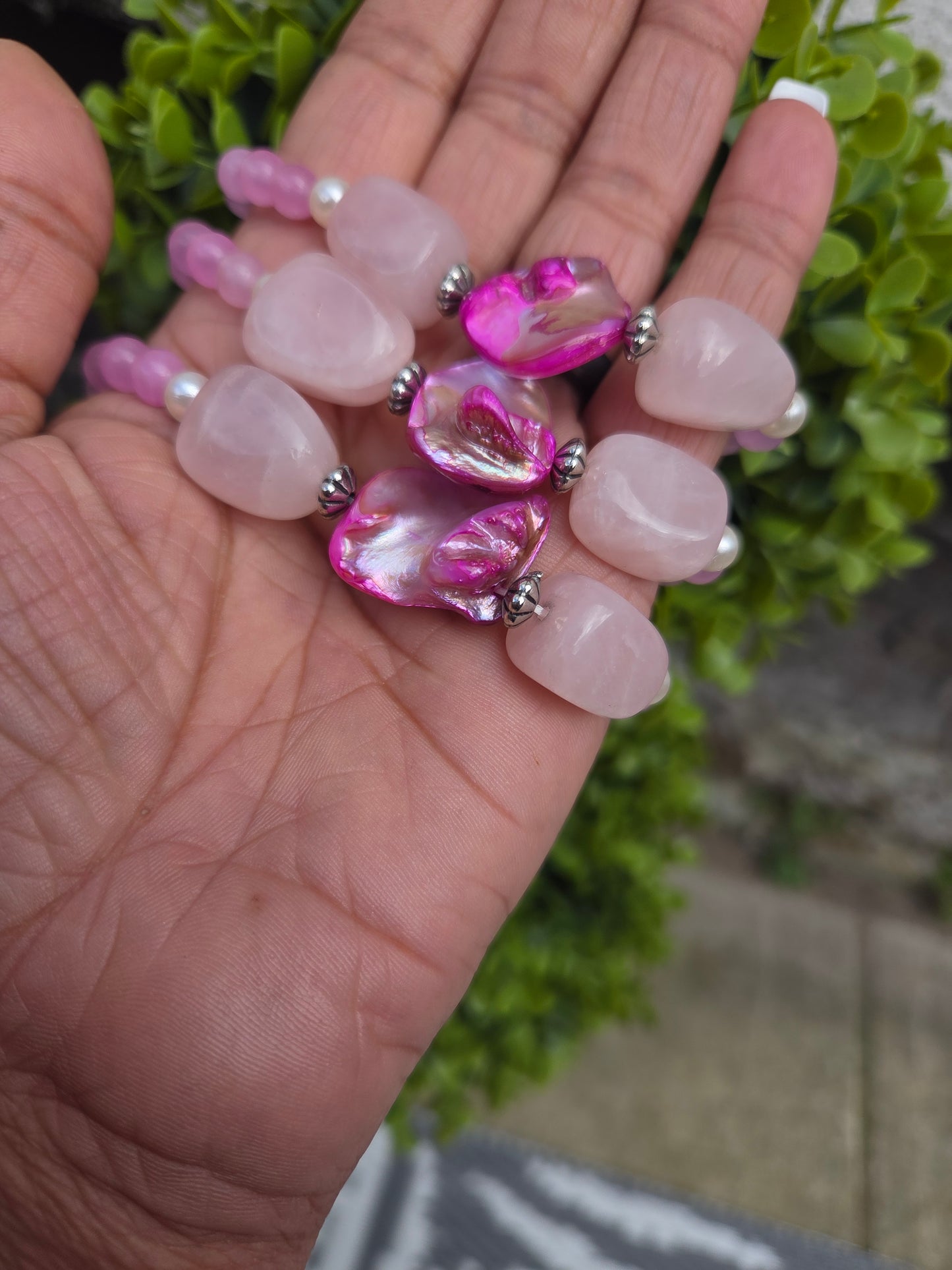 Mother of pearl and rose quartz bracelets.