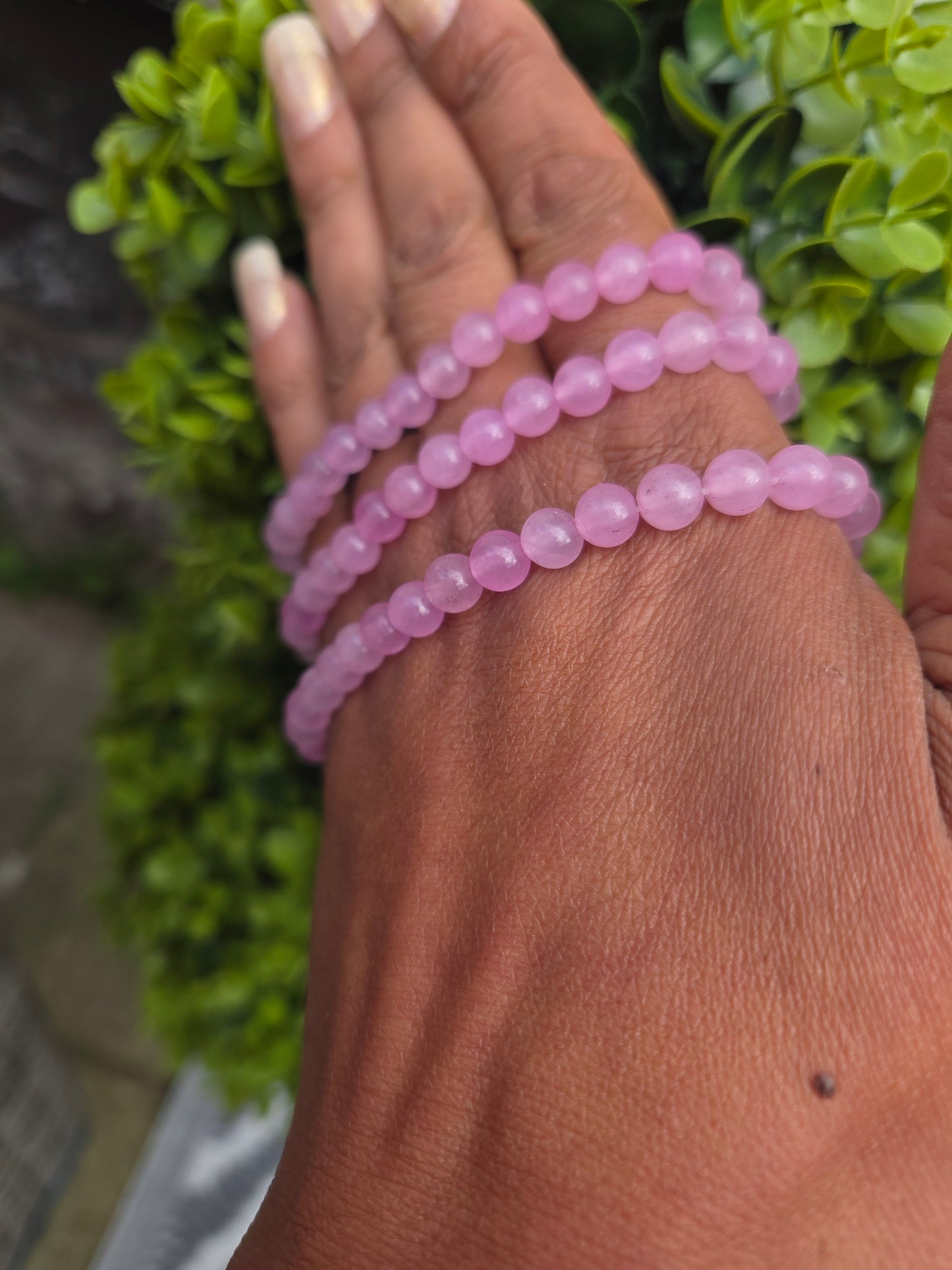 Mother of pearl and rose quartz bracelets.