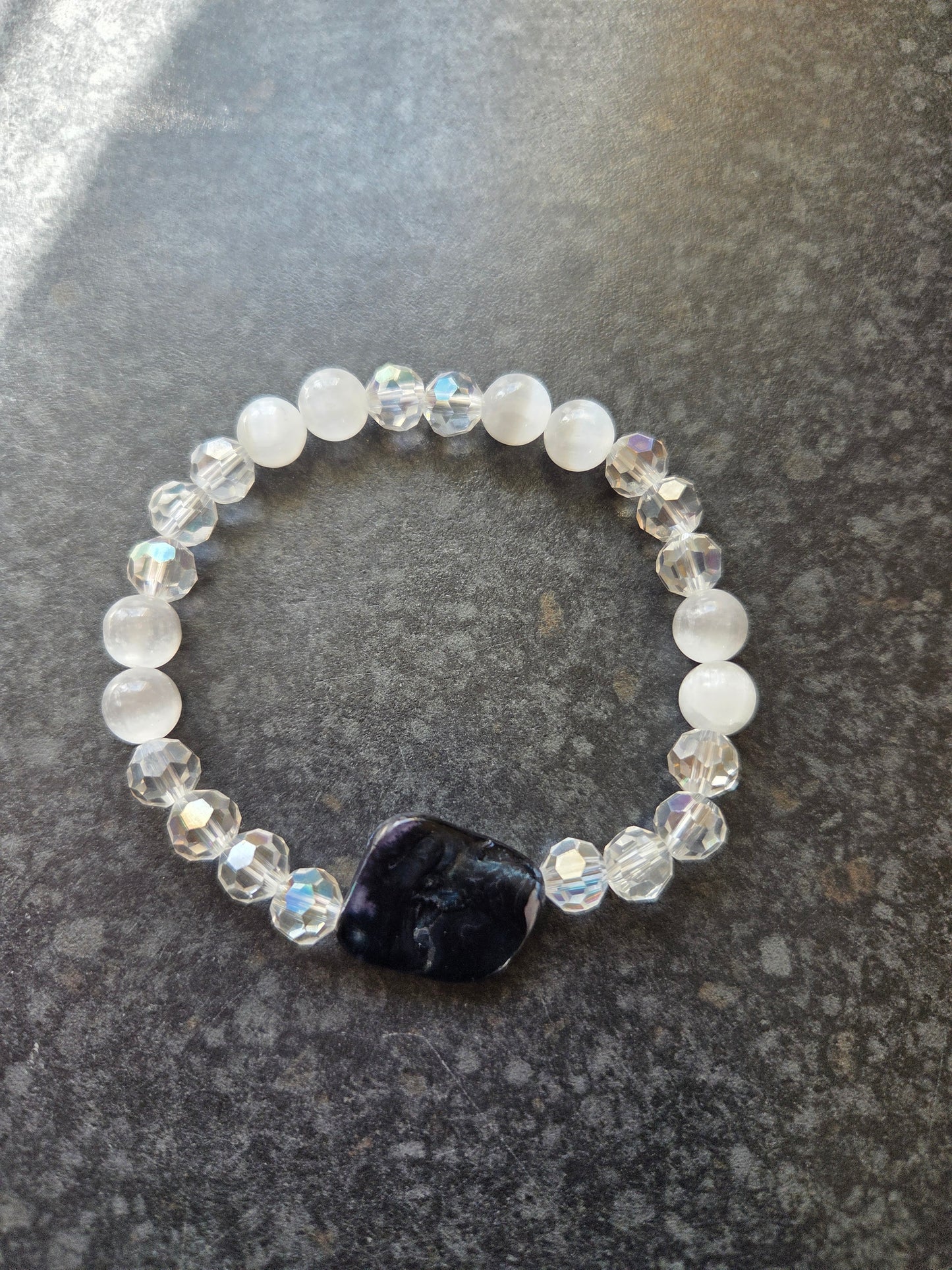 Mother of pearl and selenite bracelets.