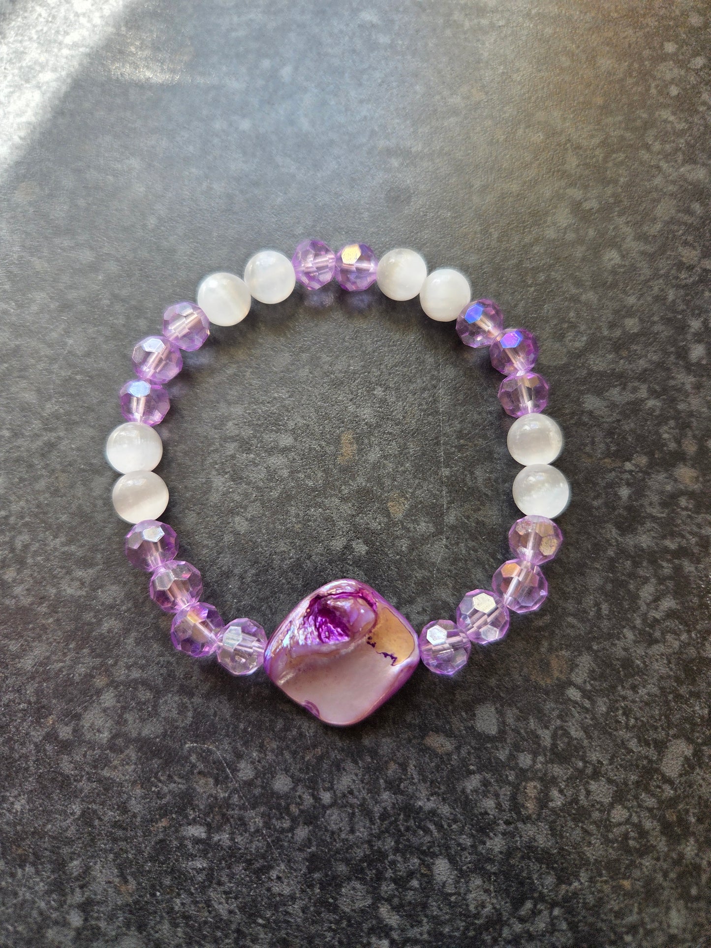 Mother of pearl and selenite bracelets.
