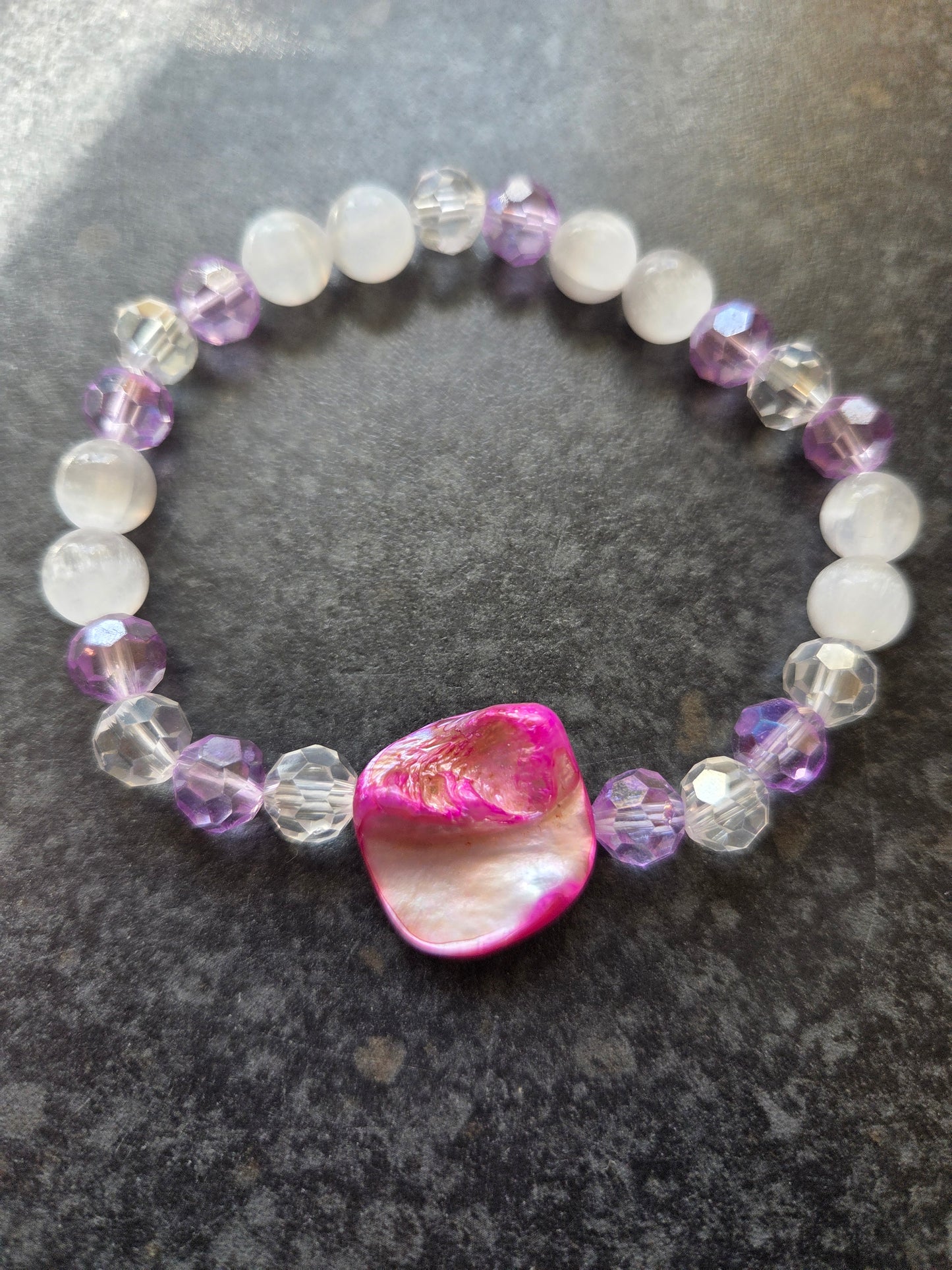 Mother of pearl and selenite bracelets.