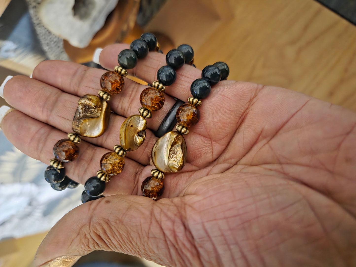 Mother of pearl, Moss Agate and gold hematite bracelets.