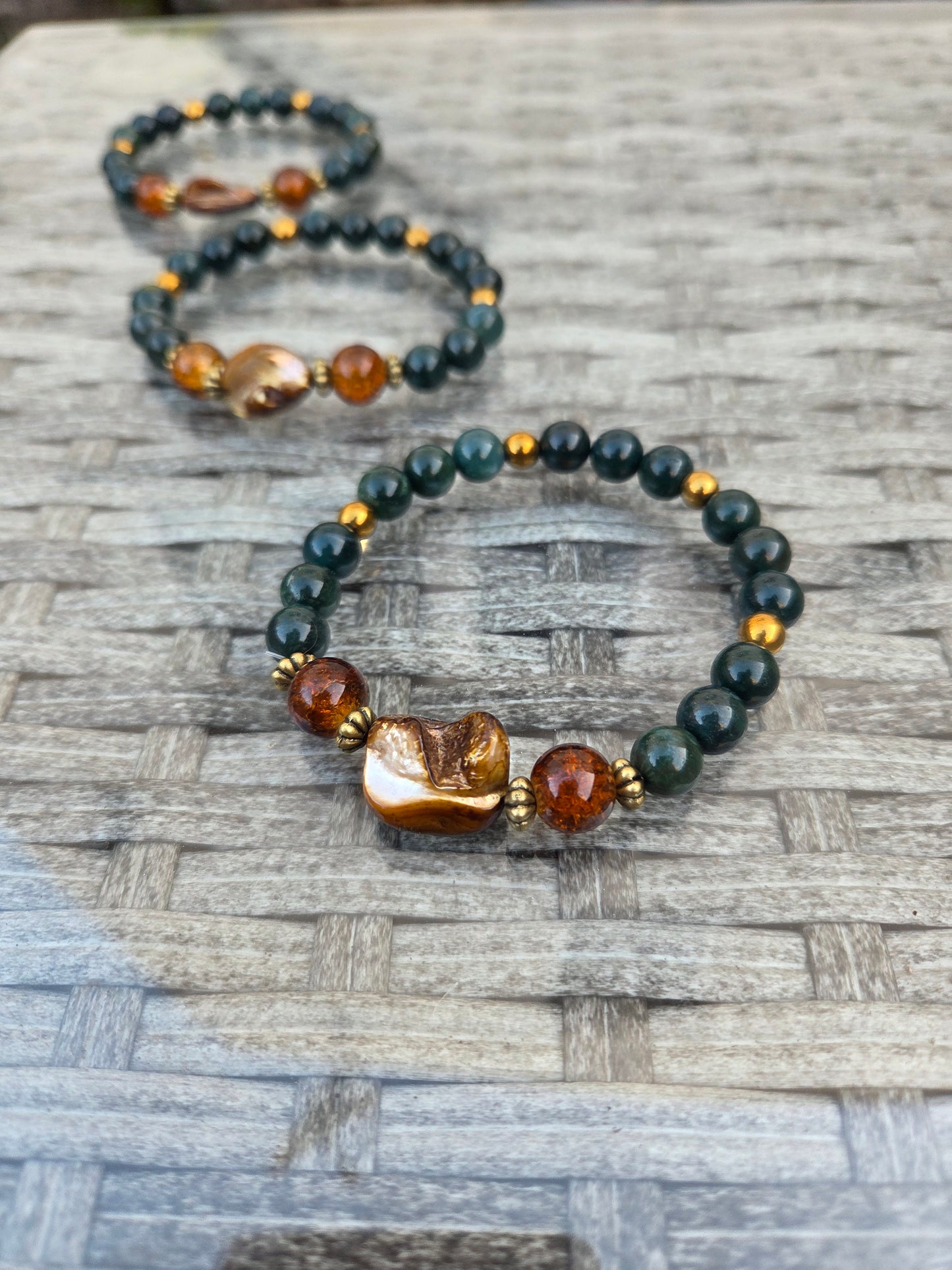 Mother of pearl, Moss Agate and gold hematite bracelets.