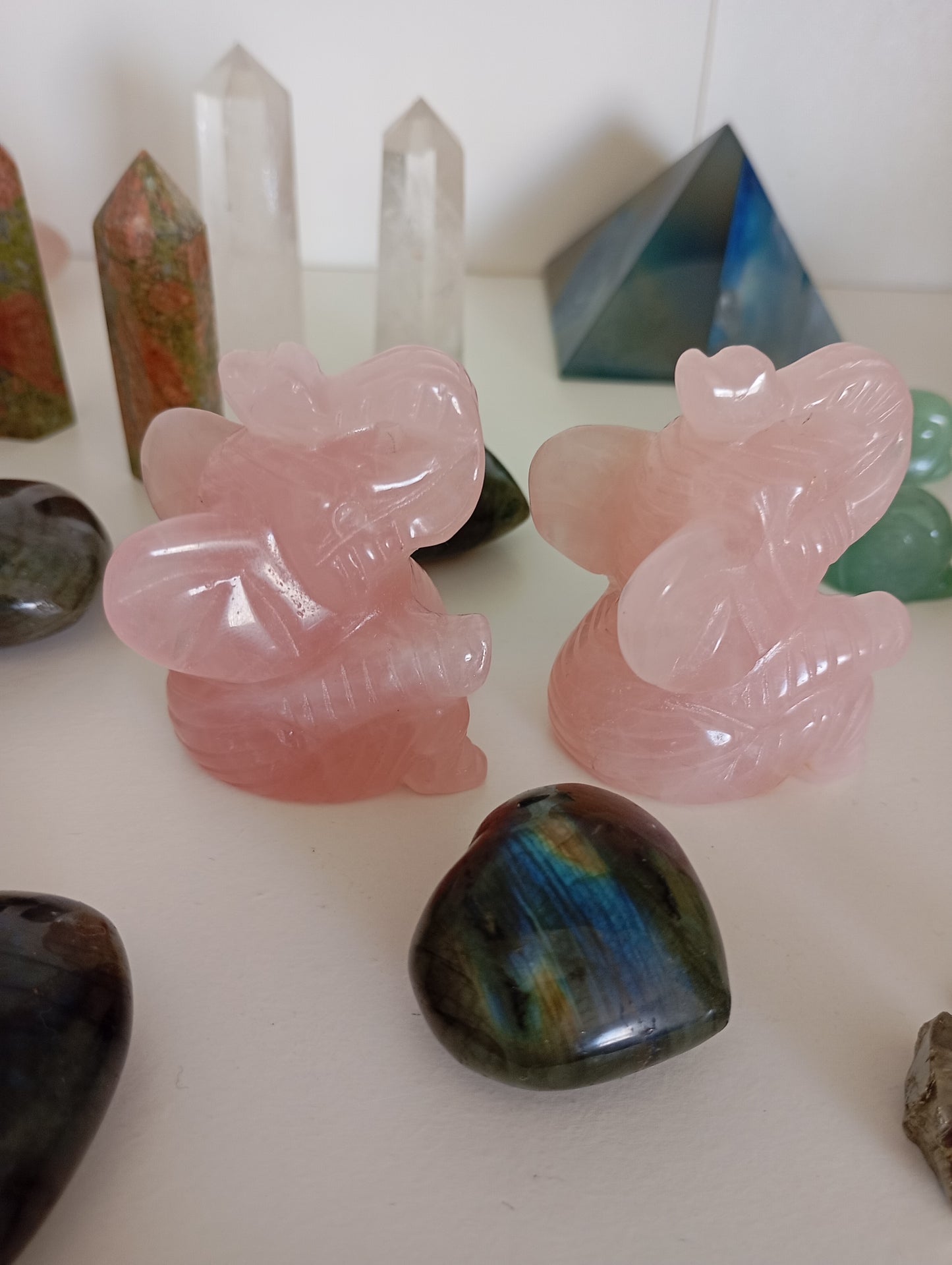 Rose quartz elephant carvings.