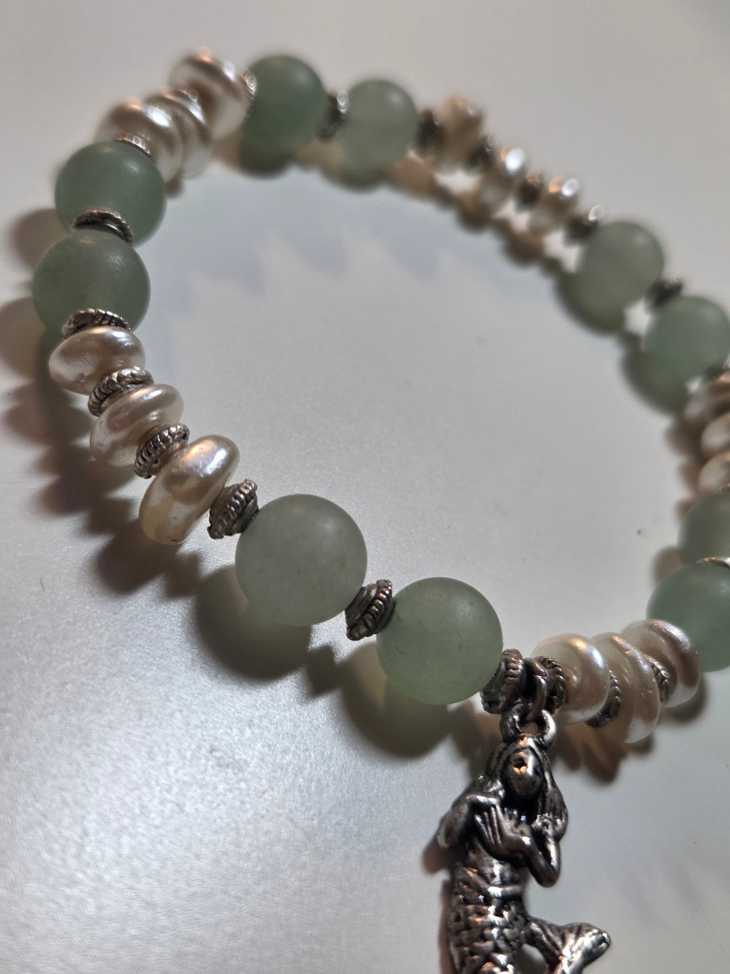 Green aventurine and fresh water pearl with mermaid charm.