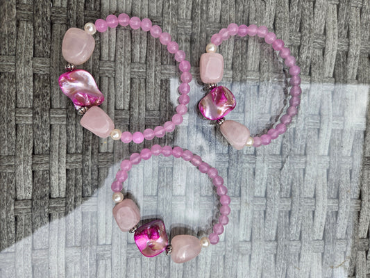 Mother of pearl and rose quartz bracelets.