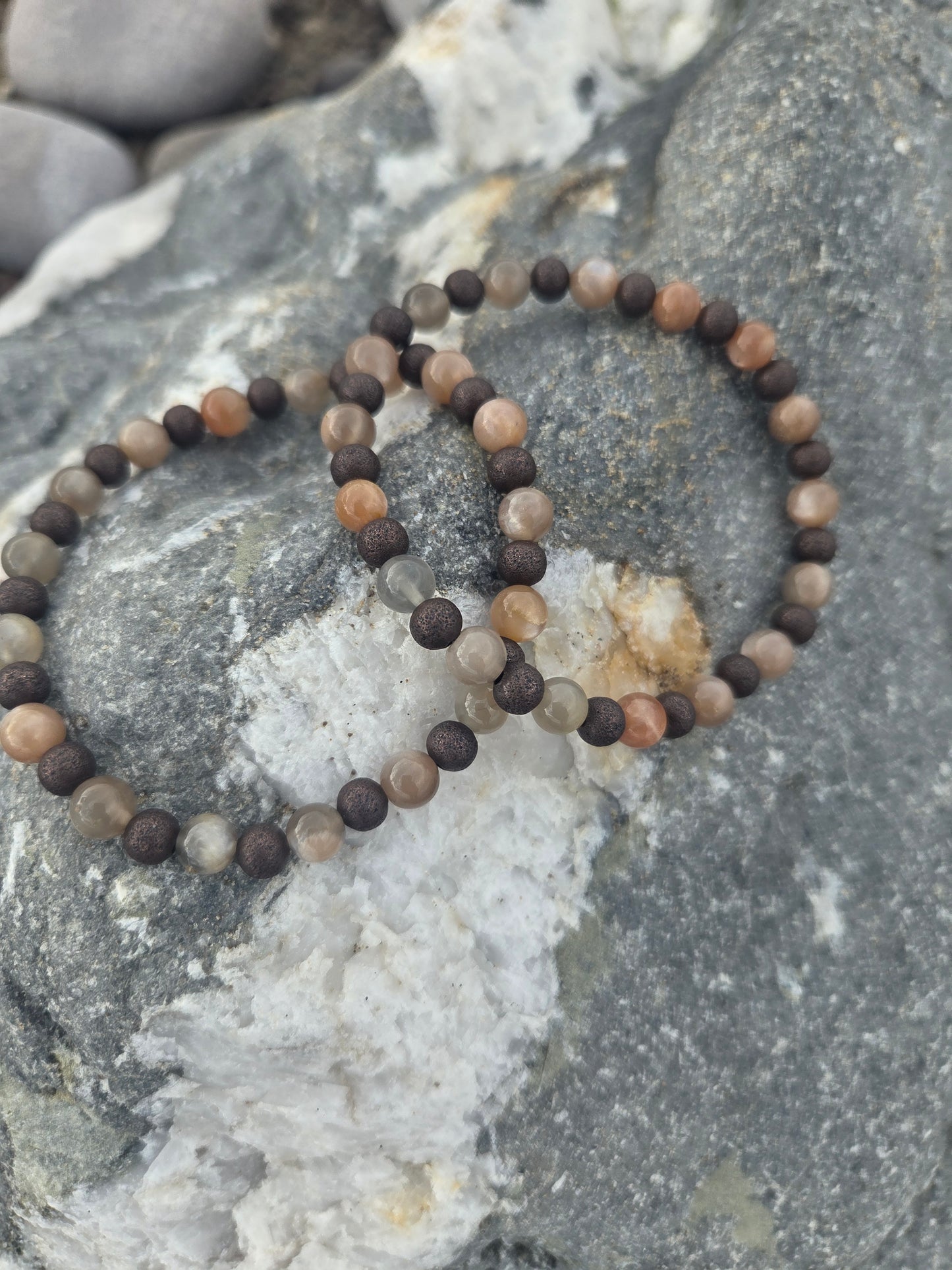 3 in 1 Grey and peach moonstone with red copper beads.