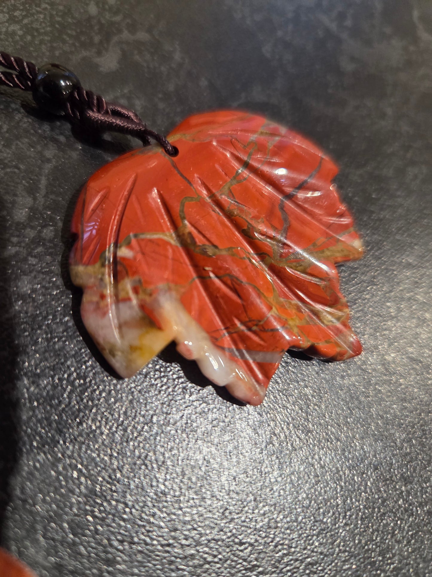 Red jasper leaf necklace.