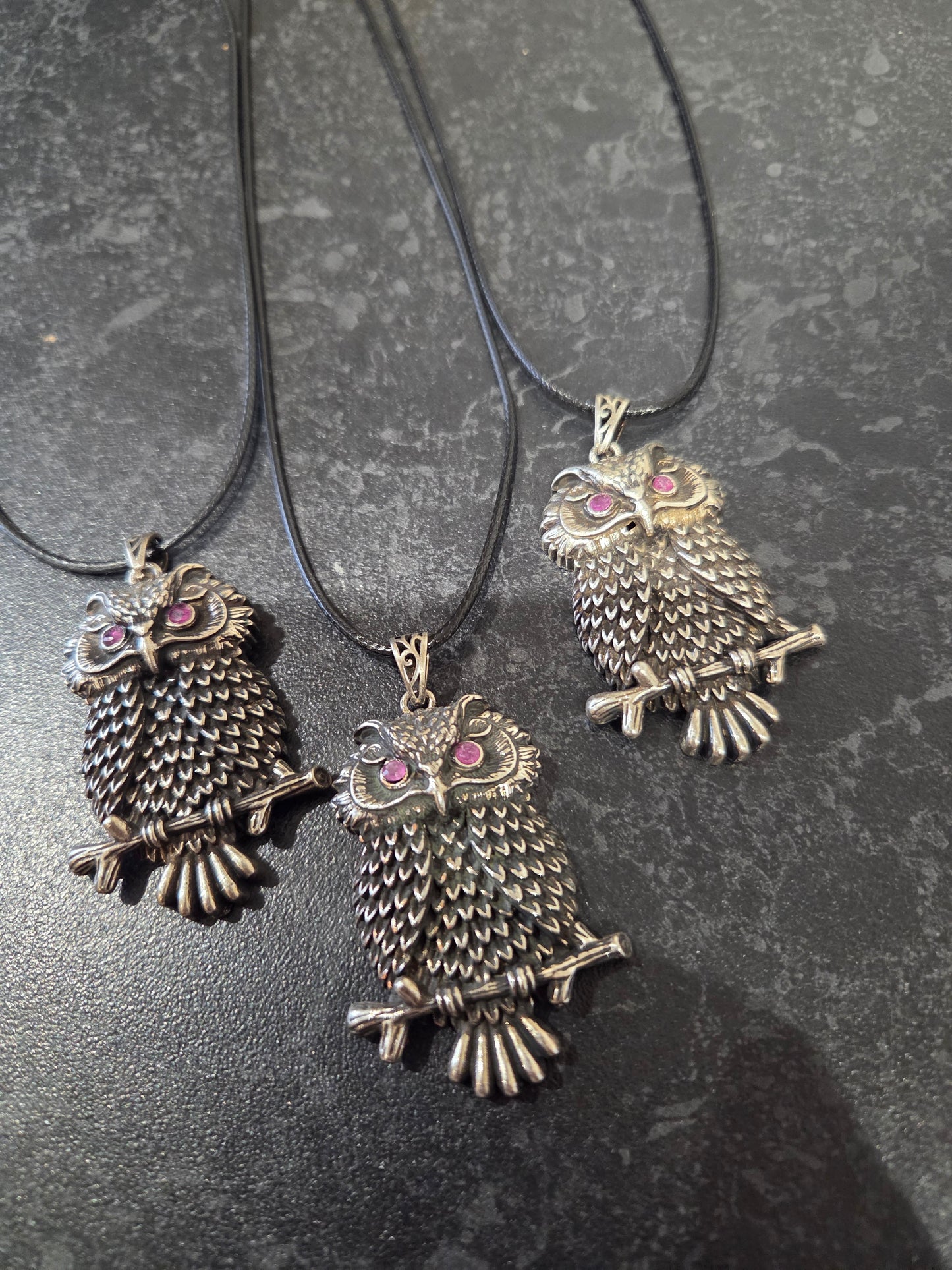 Owl pendant with ruby eyes.