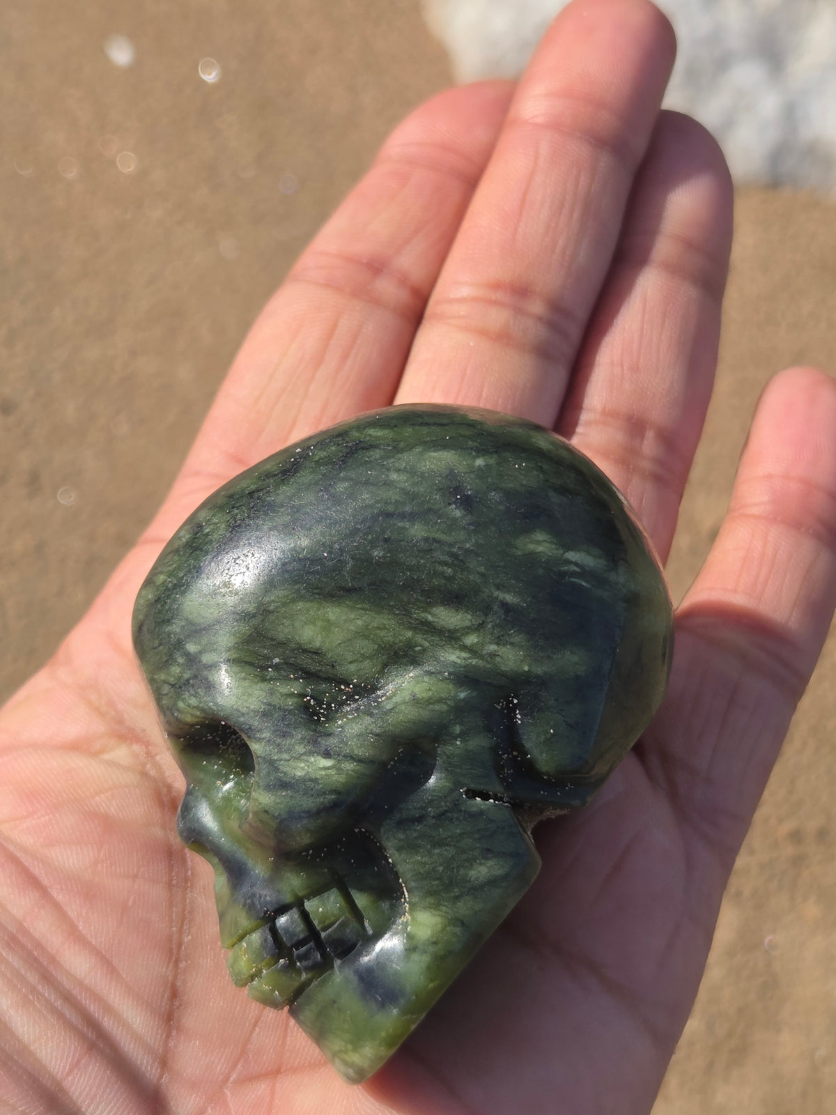 Serpentine jade skulls