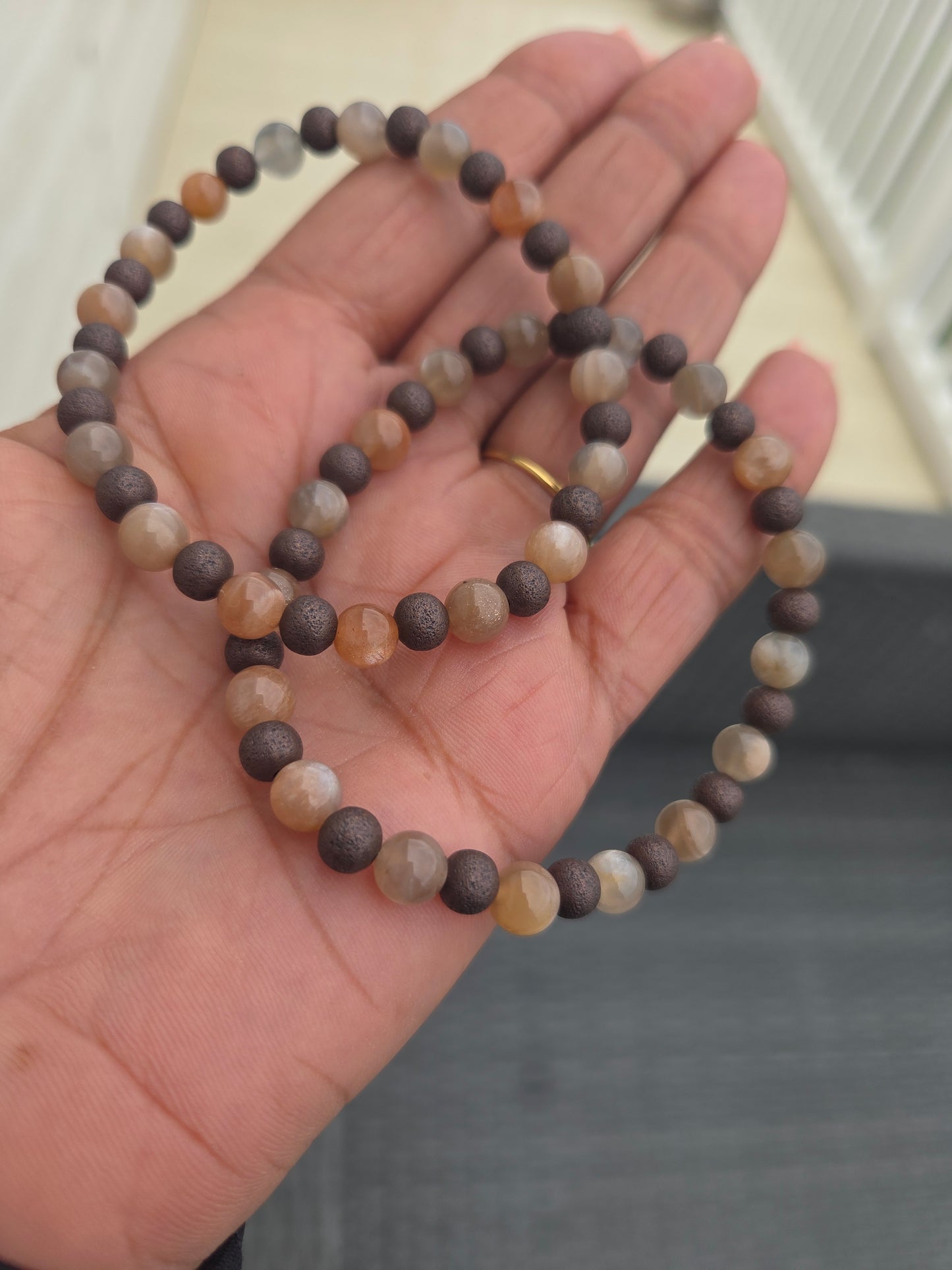 3 in 1 Grey and peach moonstone with red copper beads.