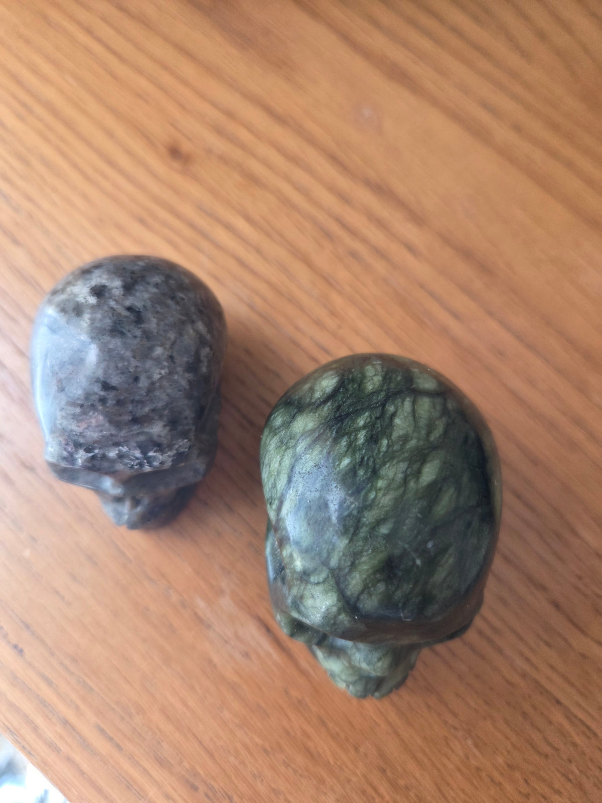 Serpentine jade skulls