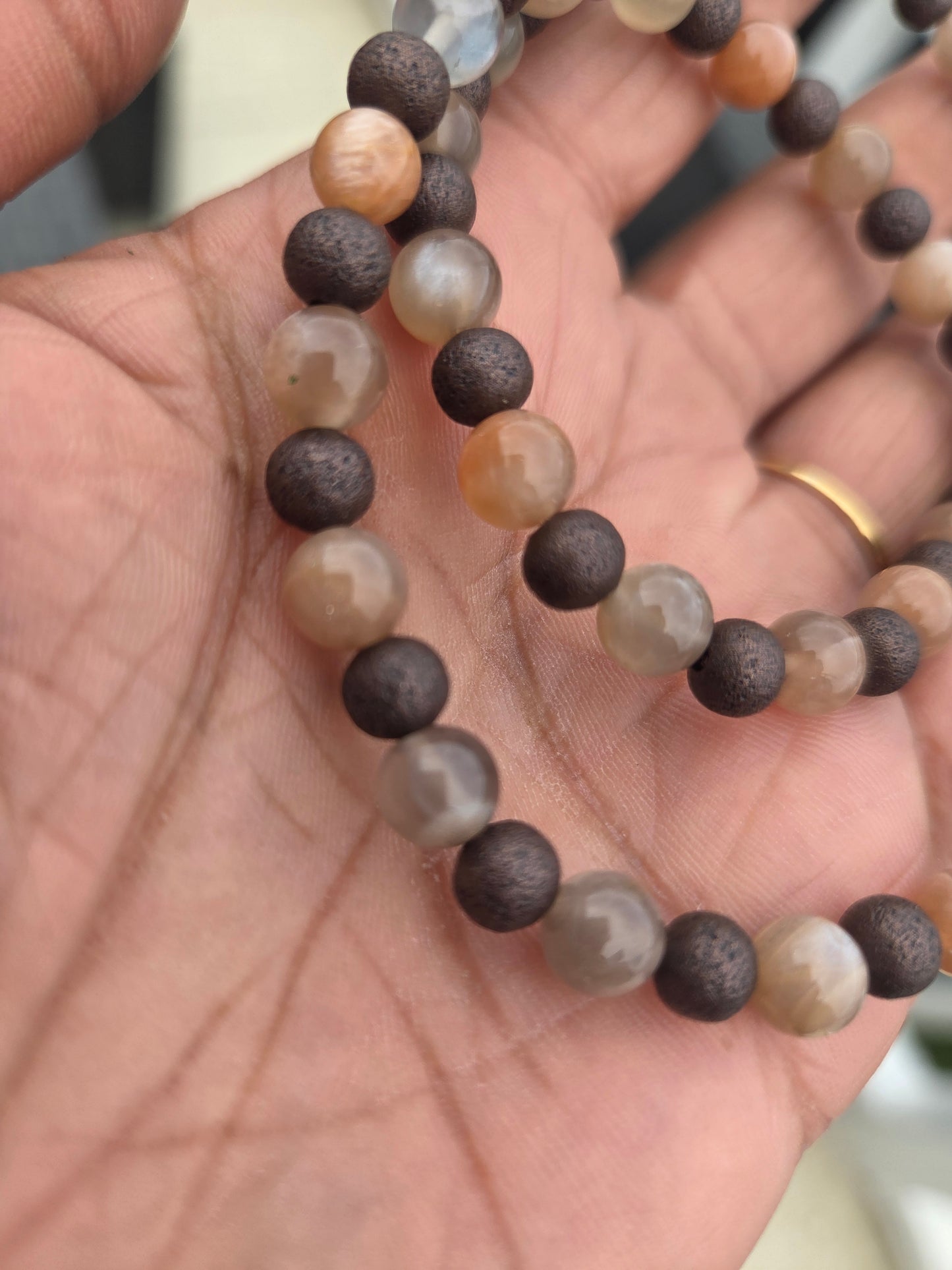 3 in 1 Grey and peach moonstone with red copper beads.