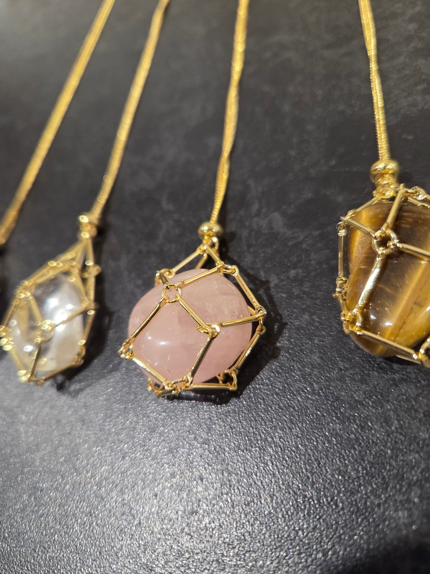 Crystal cage with a crystal