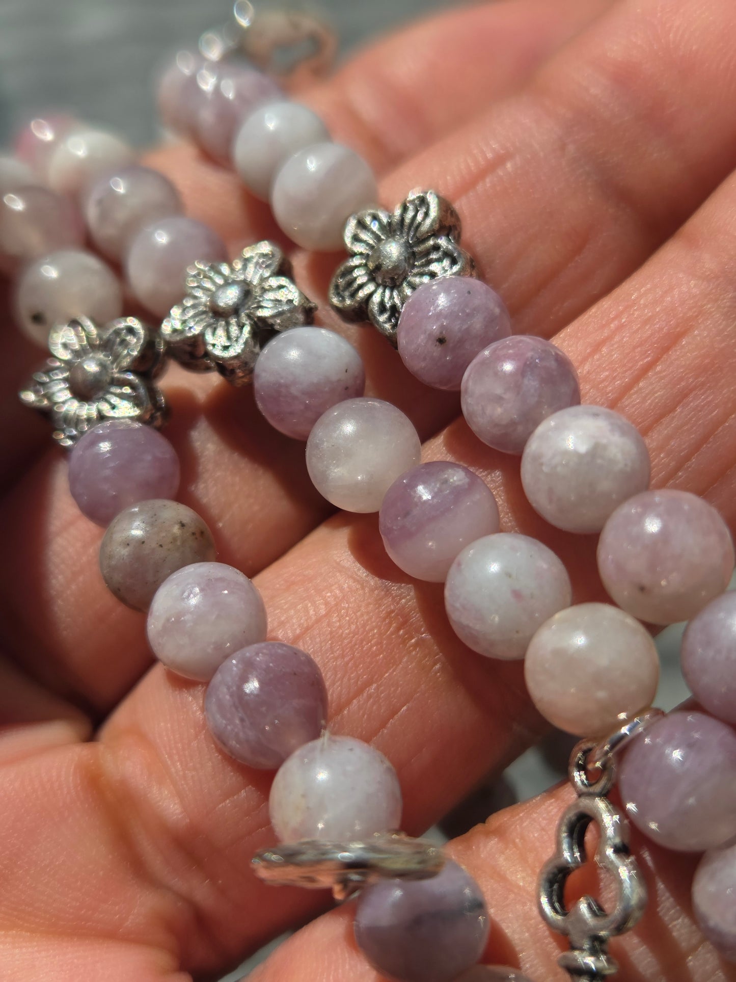 Pink tourmaline bracelet with lock and key charm.