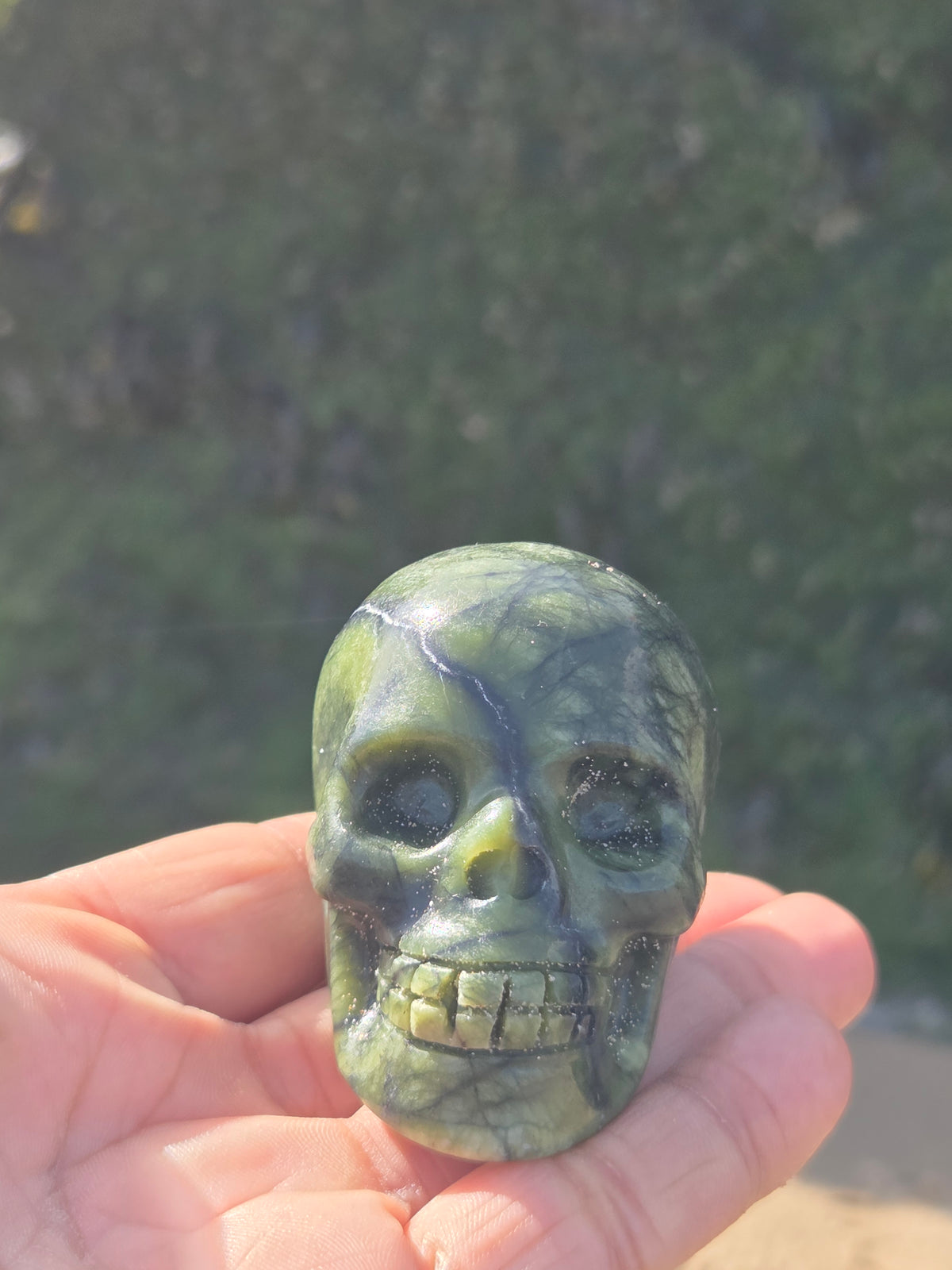 Serpentine jade skulls
