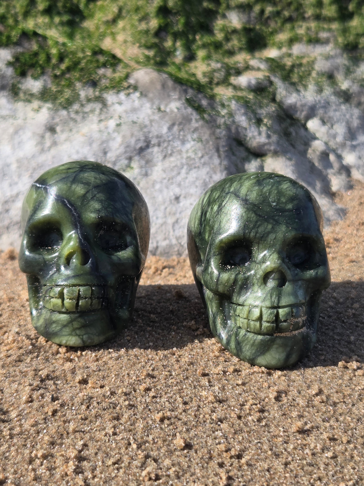Serpentine jade skulls