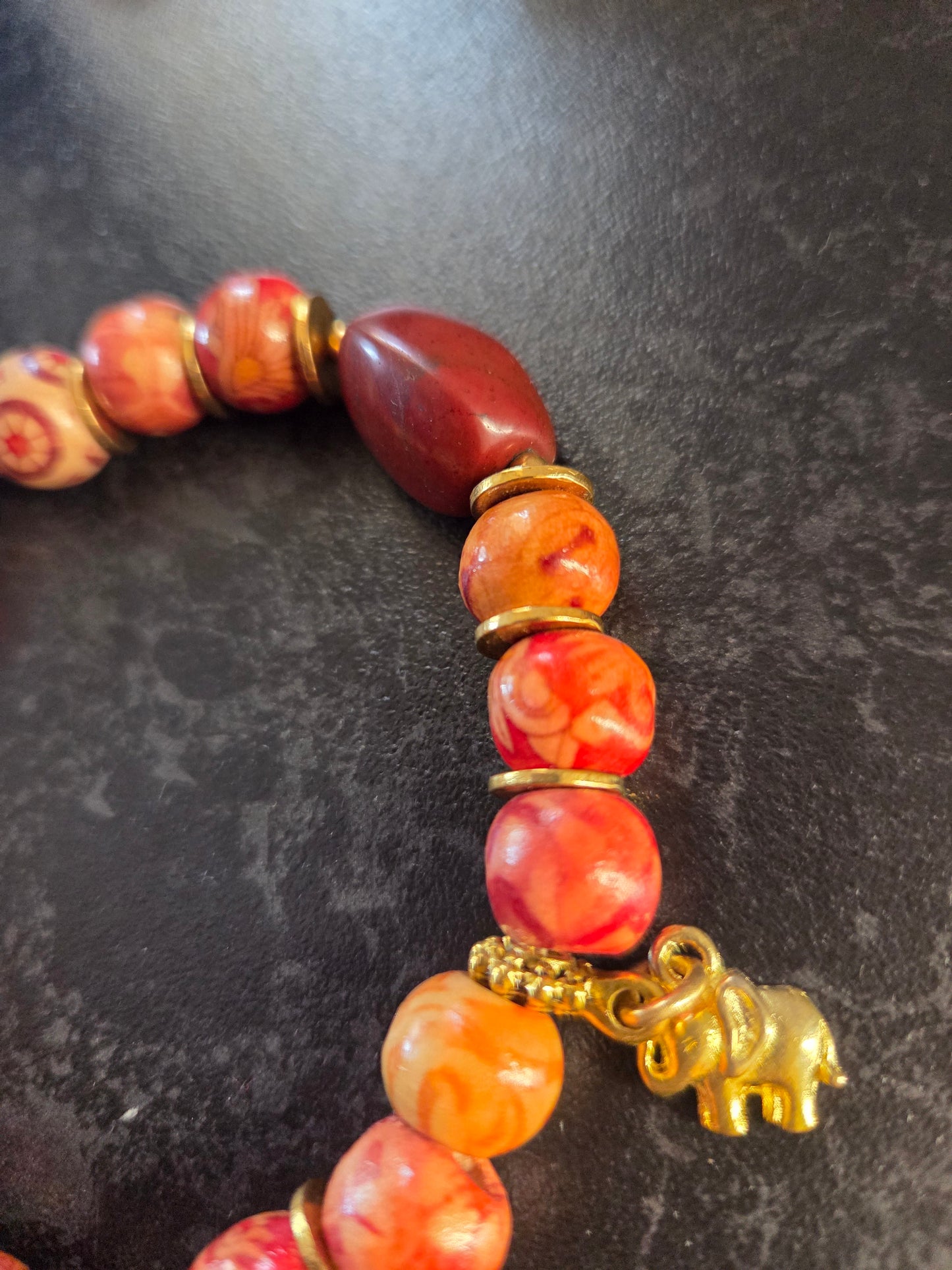 Red jasper and wood, elephant charm bracelet